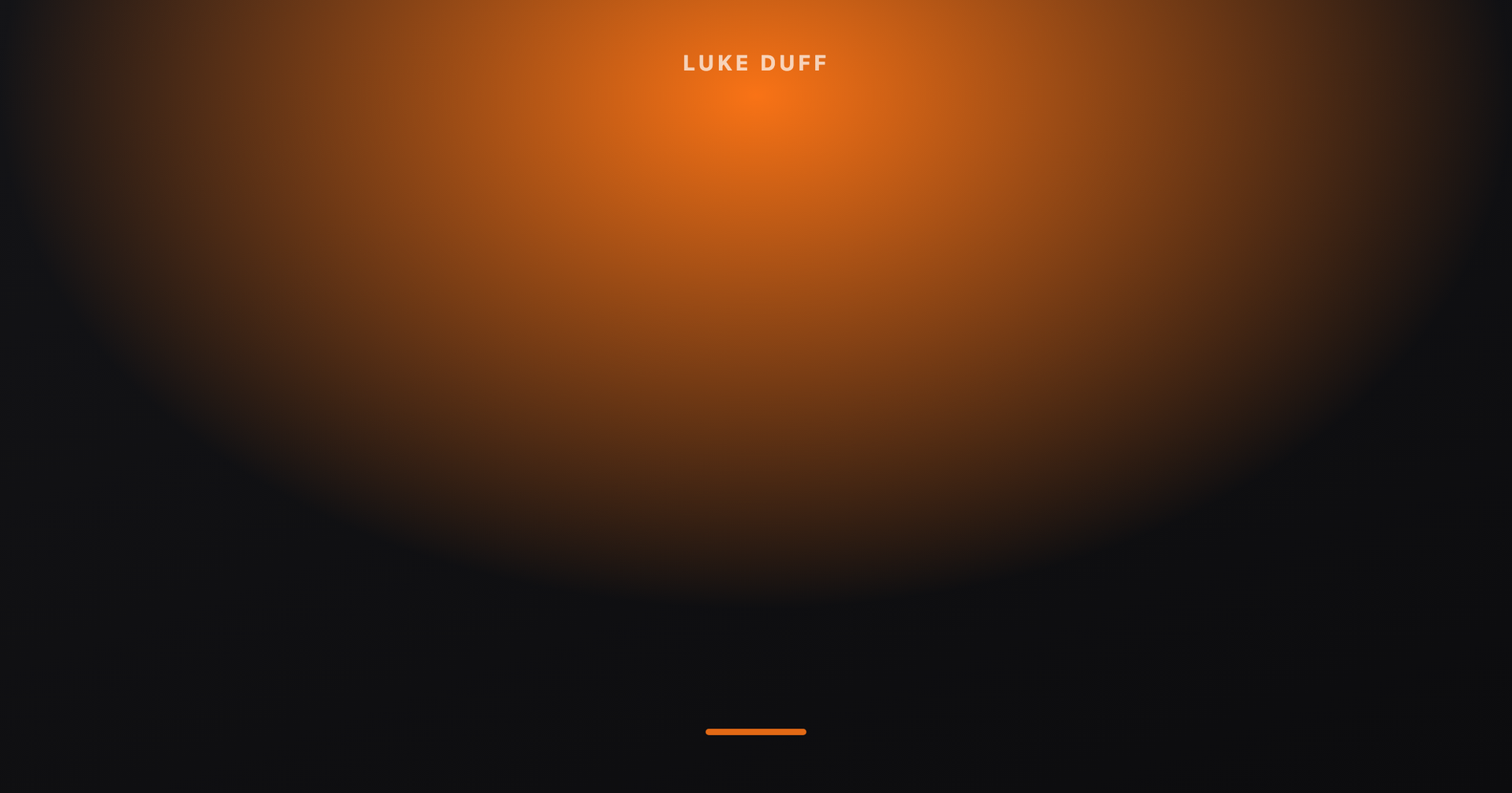 A blurry image of a light that says "Luke Duff" on it.